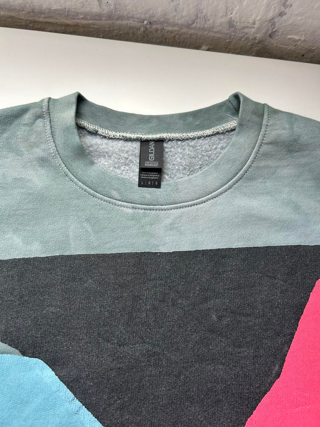 ildan organic khaki green/grey, blue, black, pink printed sweatshirt by OADC, 2026