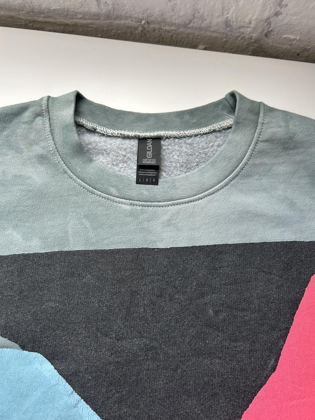 ildan organic khaki green/grey, blue, black, pink printed sweatshirt by OADC, 2026